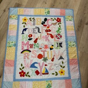 Hawaiian baby quilt with alphabet